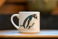 TAZA CAFÉ PINGÜINO PAPÚA